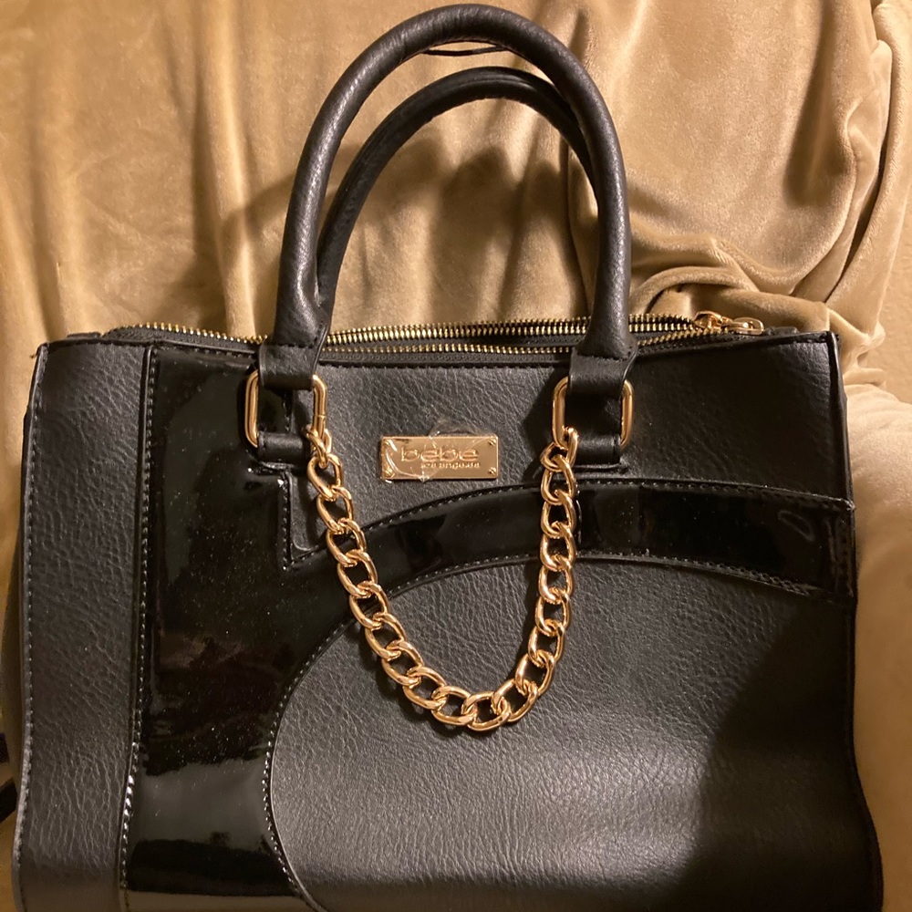 Bebe handbag with cross body strap! Cute retro vintage look!
